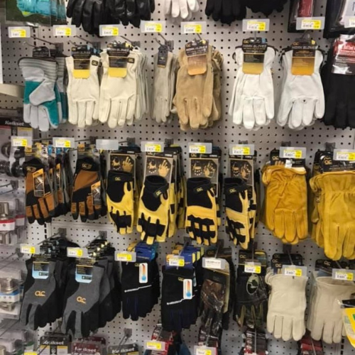 Gloves and supplies on display inside of Melby's Home Center.